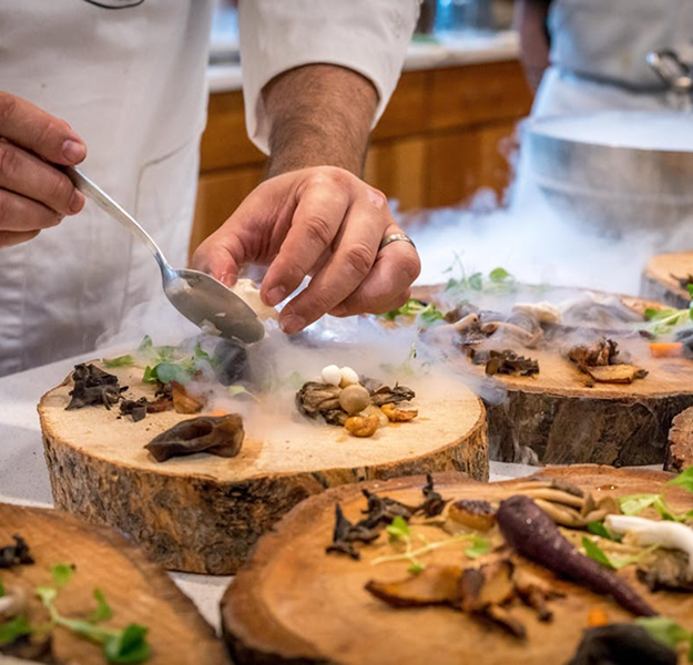 Chef plating a dish