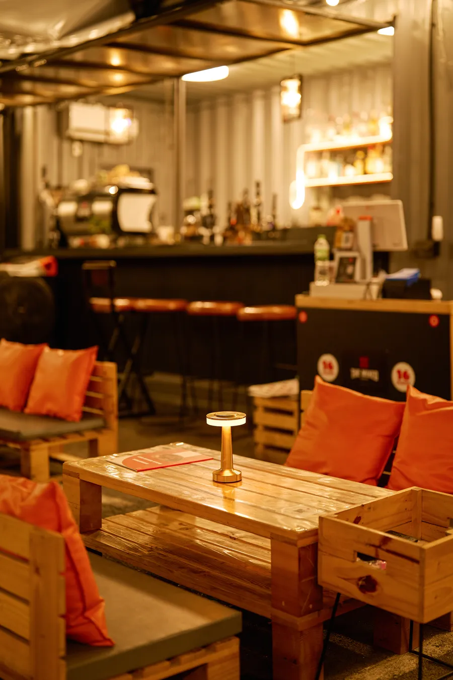Warm dining area inside Sixteen Plates