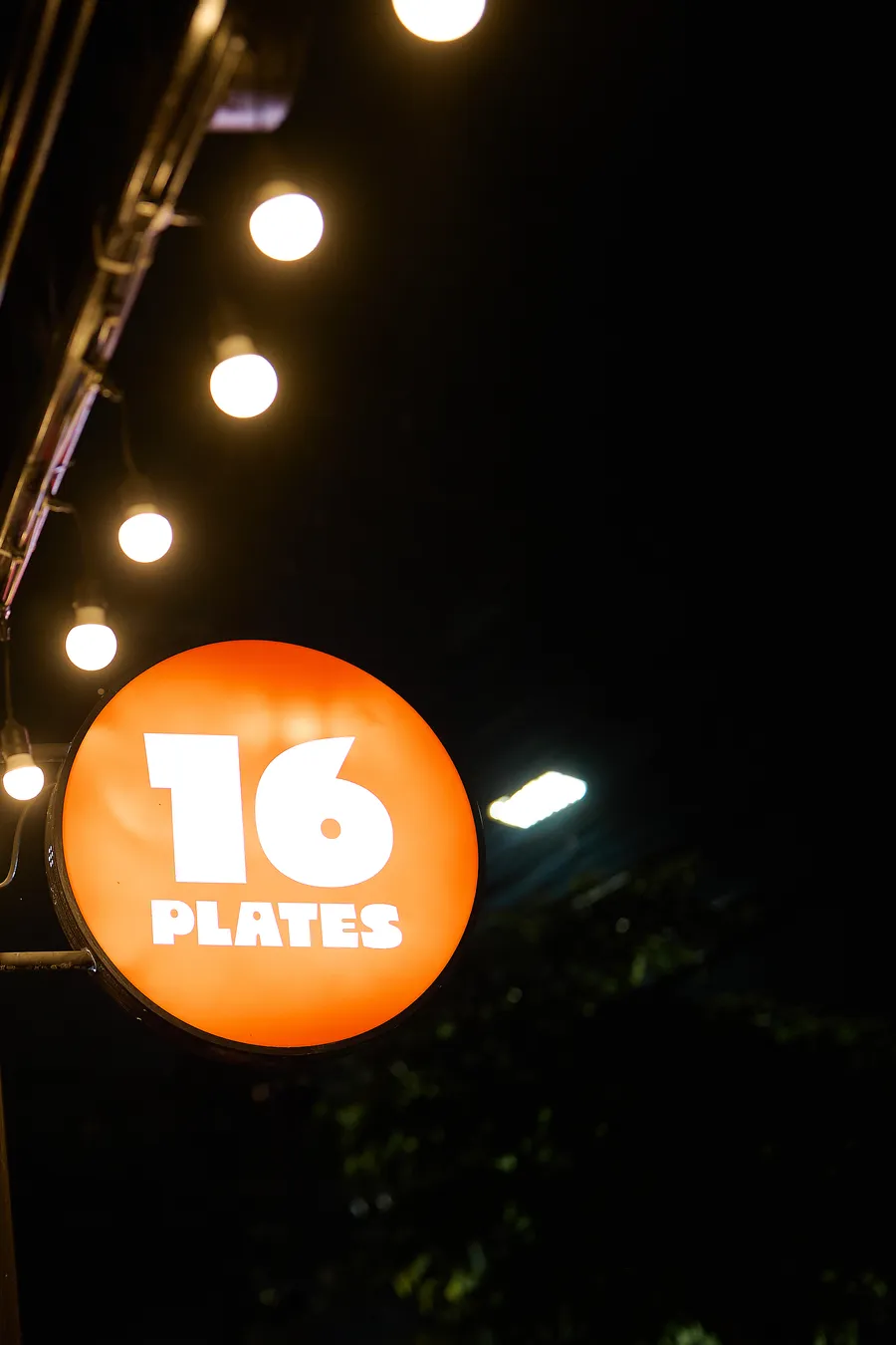 Sixteen Plates illuminated sign