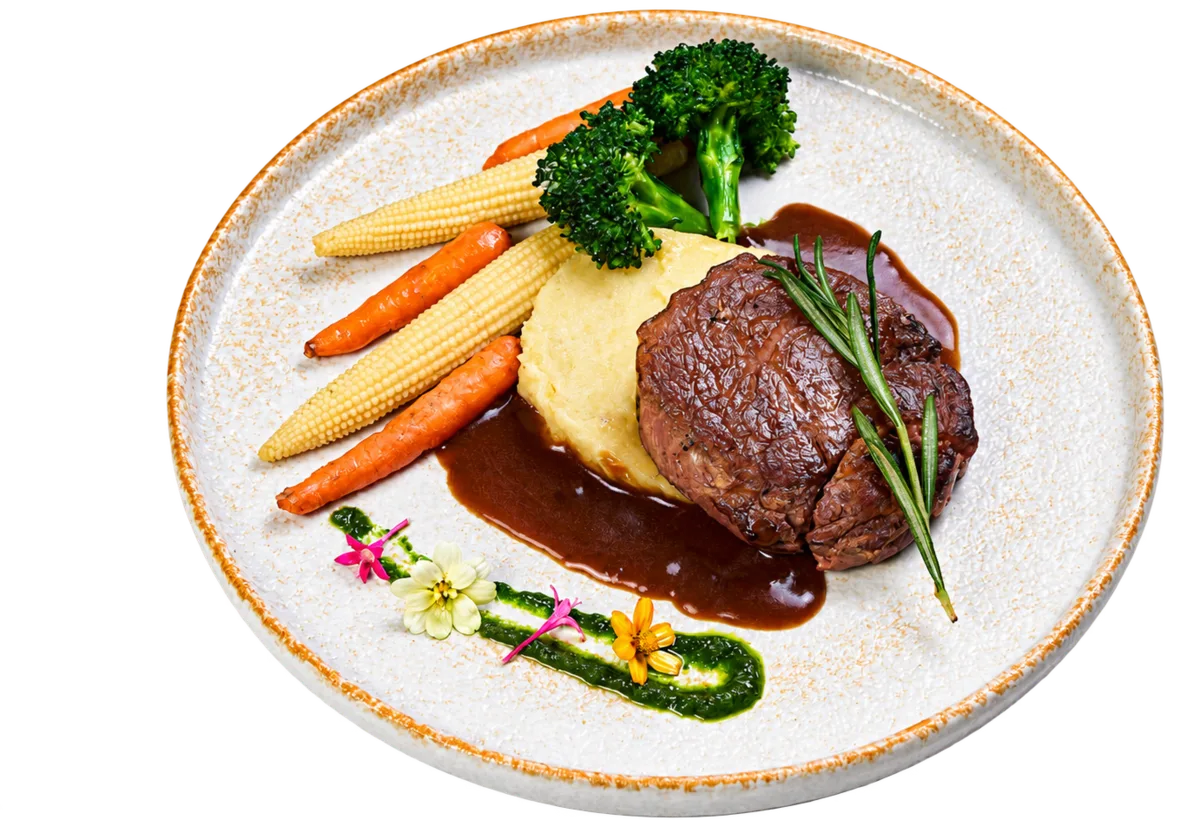 Tenderloin steak with mashed potato and vegetables