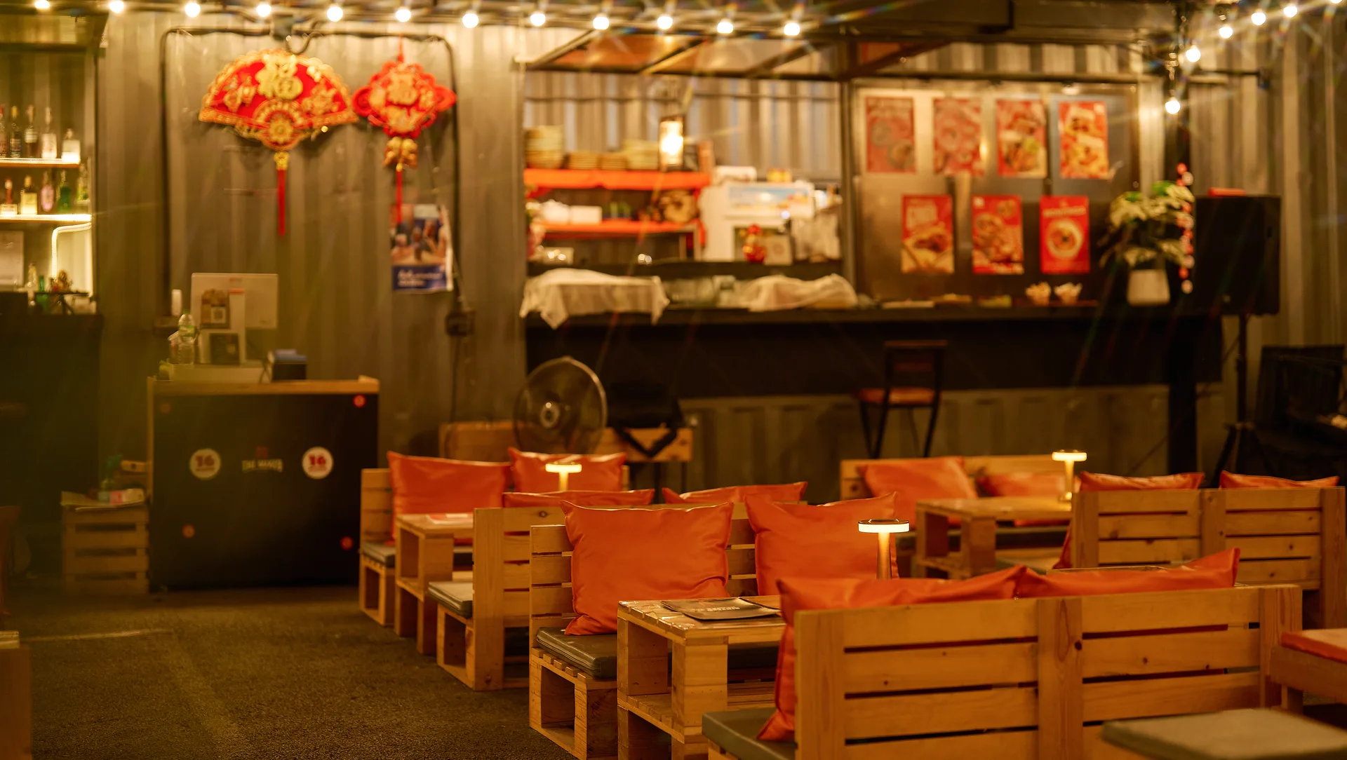 Warm outdoor dining area at Sixteen Plates