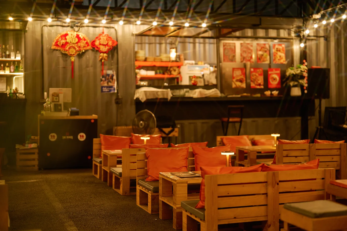 Warm outdoor dining area at Sixteen Plates